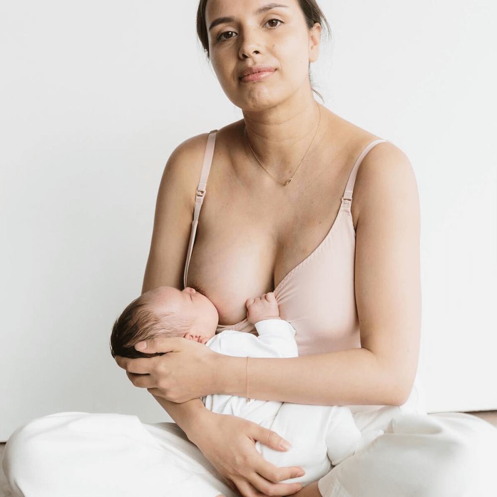 Photo of woman suckling her baby